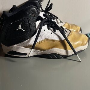 Jordan Kids' Black, White, and Gold Sneakers